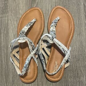 Tan sandal with black & white snakeskin strap!